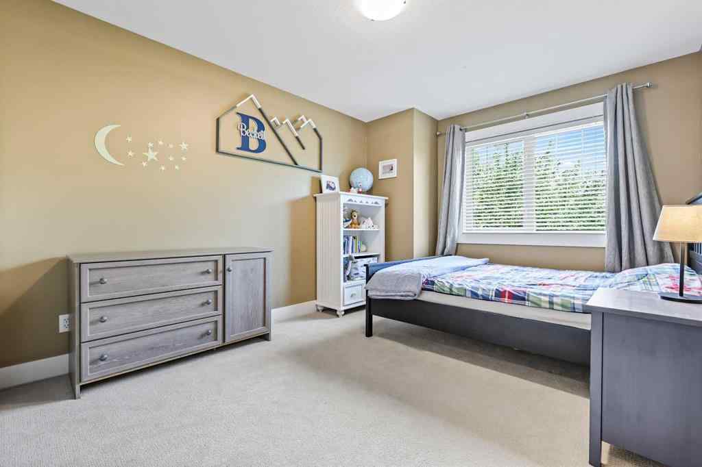 MLS® A2247309 - 140 Mike Ralph Way SW in Garrison Green Calgary, Residential