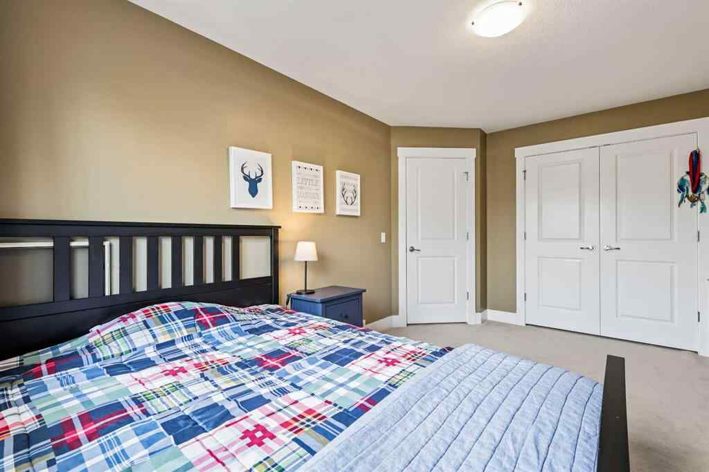 MLS® A2247309 - 140 Mike Ralph Way SW in Garrison Green Calgary, Residential
