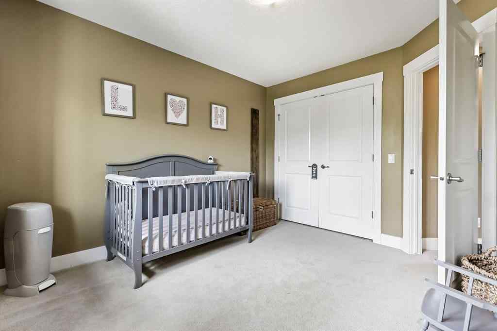 MLS® A2247309 - 140 Mike Ralph Way SW in Garrison Green Calgary, Residential