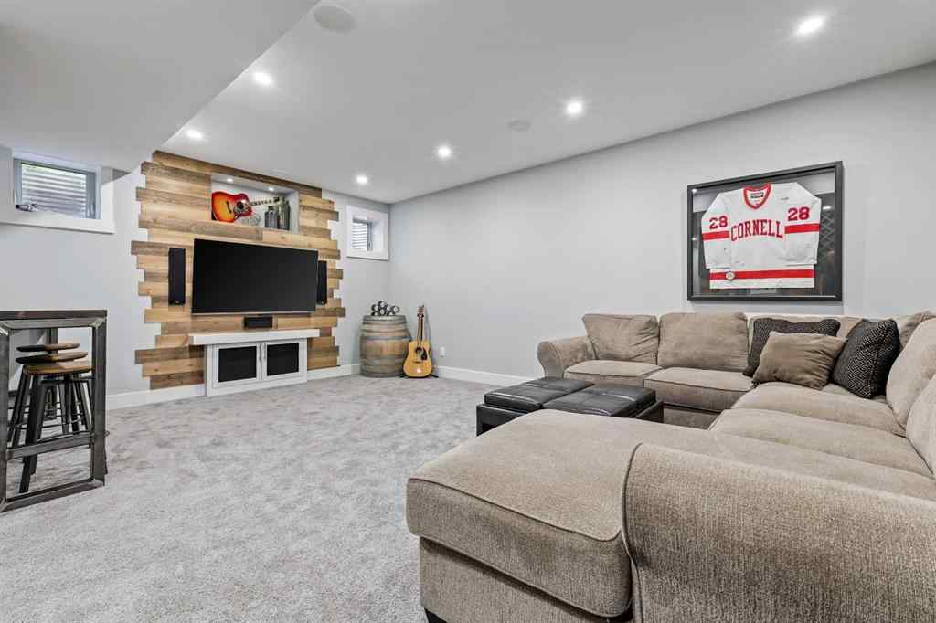 MLS® A2247309 - 140 Mike Ralph Way SW in Garrison Green Calgary, Residential