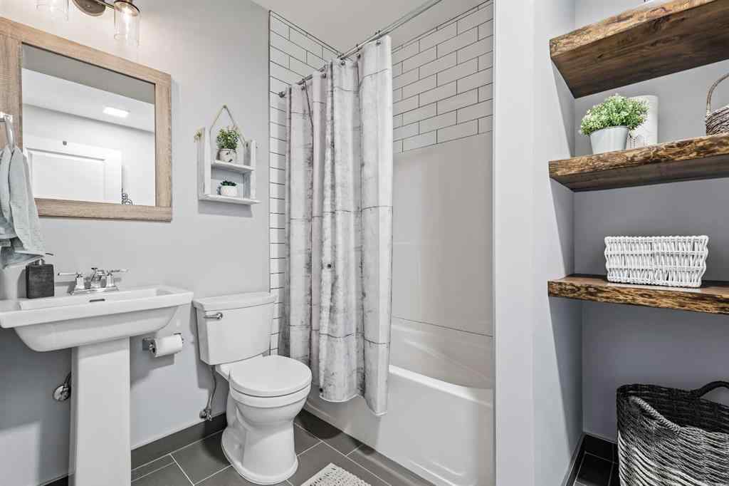 MLS® A2247309 - 140 Mike Ralph Way SW in Garrison Green Calgary, Residential