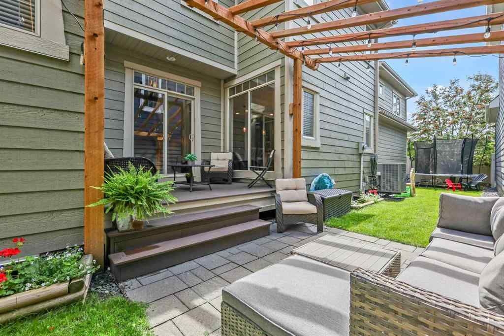 MLS® A2247309 - 140 Mike Ralph Way SW in Garrison Green Calgary, Residential