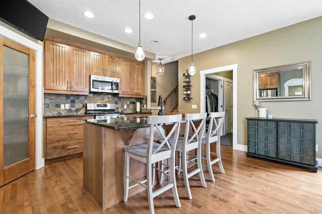 MLS® A2247309 - 140 Mike Ralph Way SW in Garrison Green Calgary, Residential