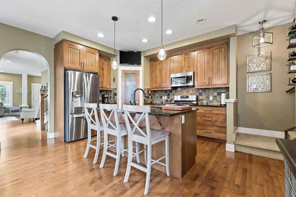 MLS® A2247309 - 140 Mike Ralph Way SW in Garrison Green Calgary, Residential