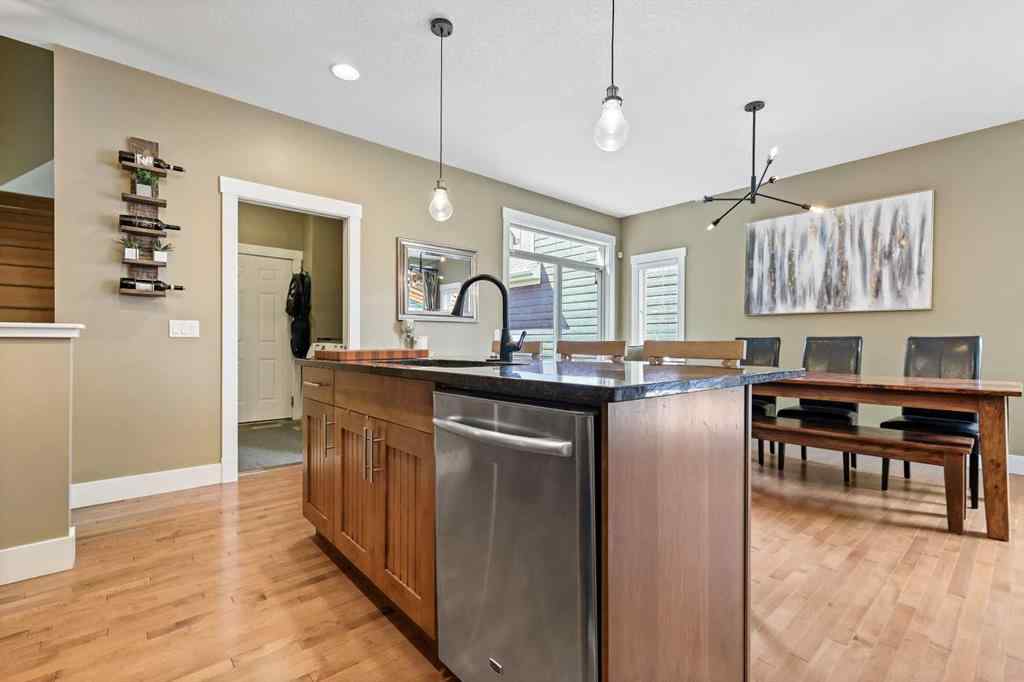 MLS® A2247309 - 140 Mike Ralph Way SW in Garrison Green Calgary, Residential