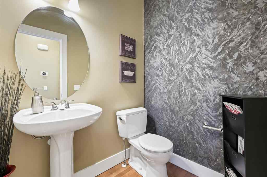 MLS® A2247309 - 140 Mike Ralph Way SW in Garrison Green Calgary, Residential