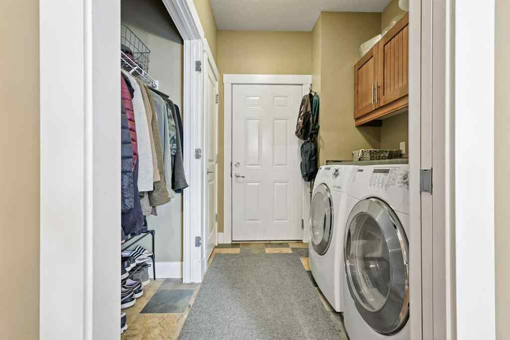 MLS® A2247309 - 140 Mike Ralph Way SW in Garrison Green Calgary, Residential