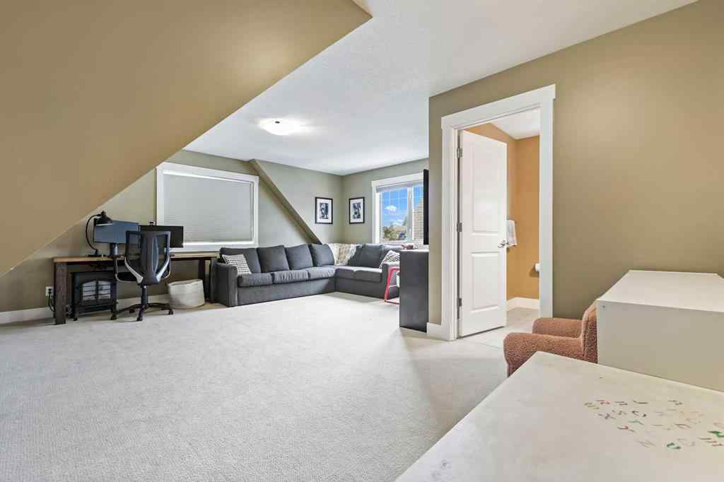MLS® A2247309 - 140 Mike Ralph Way SW in Garrison Green Calgary, Residential