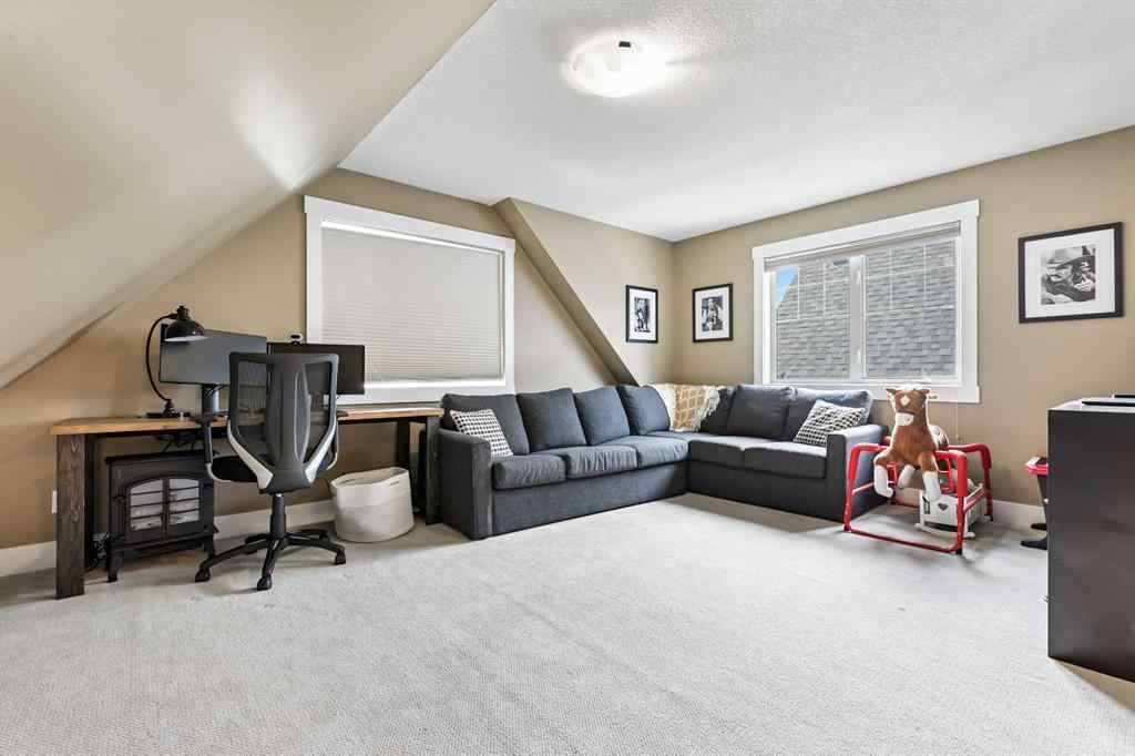 MLS® A2247309 - 140 Mike Ralph Way SW in Garrison Green Calgary, Residential