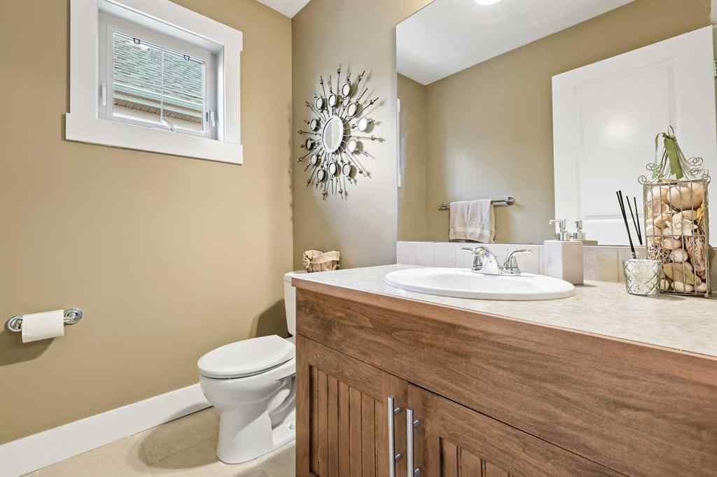 MLS® A2247309 - 140 Mike Ralph Way SW in Garrison Green Calgary, Residential