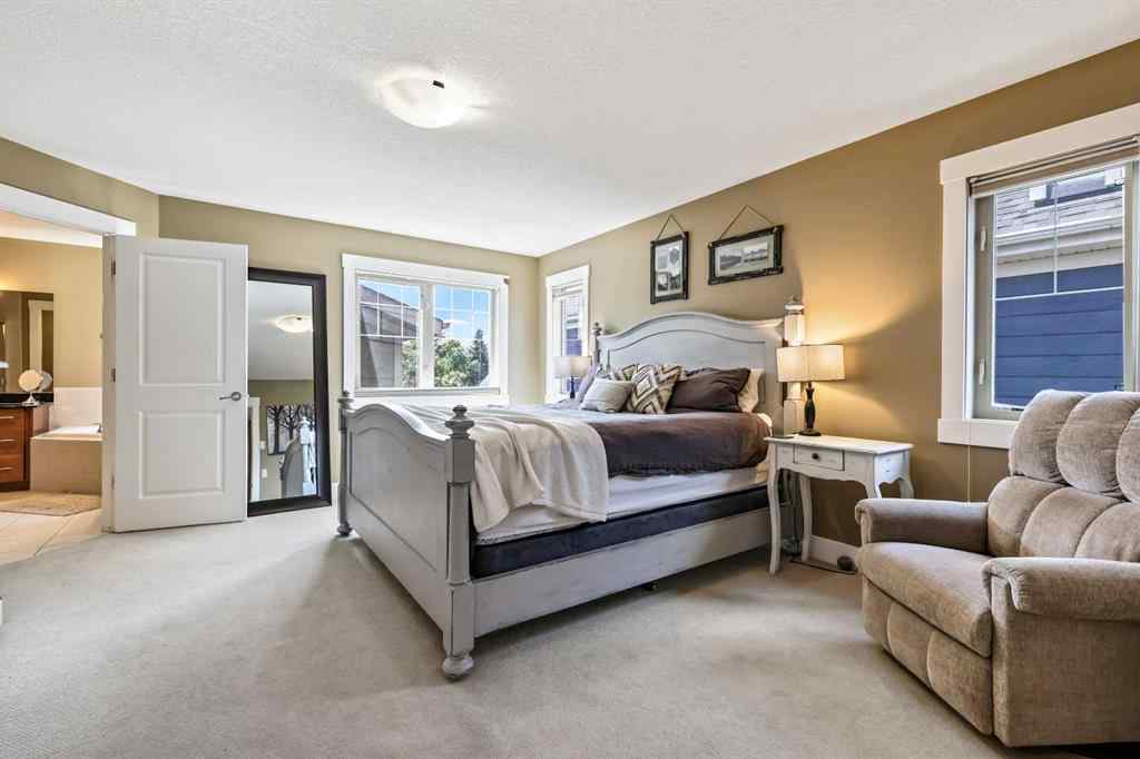 MLS® A2247309 - 140 Mike Ralph Way SW in Garrison Green Calgary, Residential