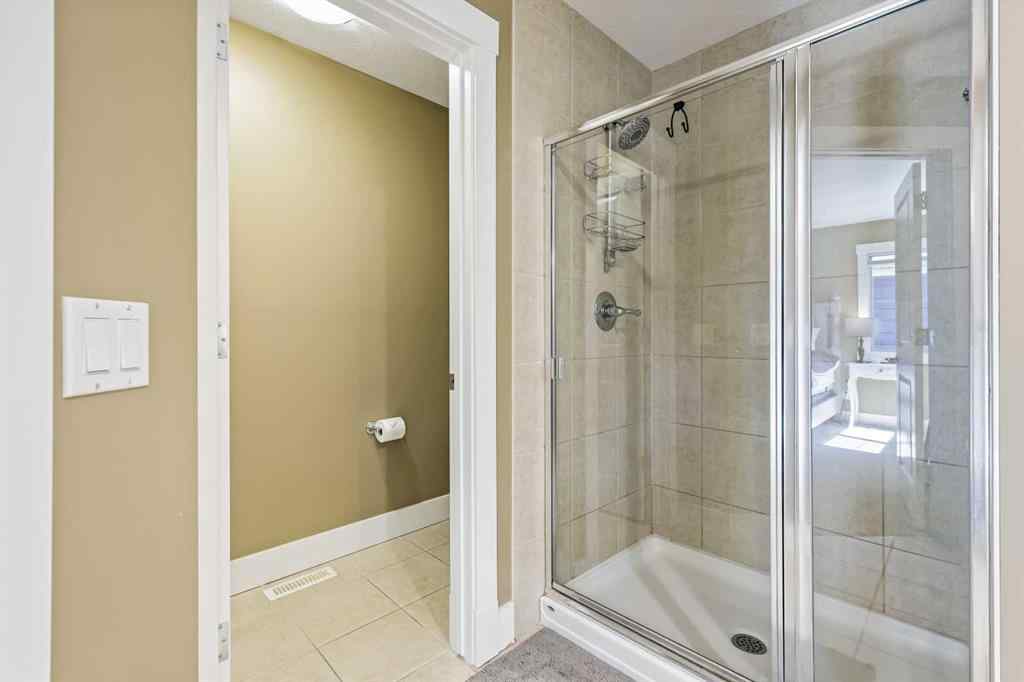 MLS® A2247309 - 140 Mike Ralph Way SW in Garrison Green Calgary, Residential