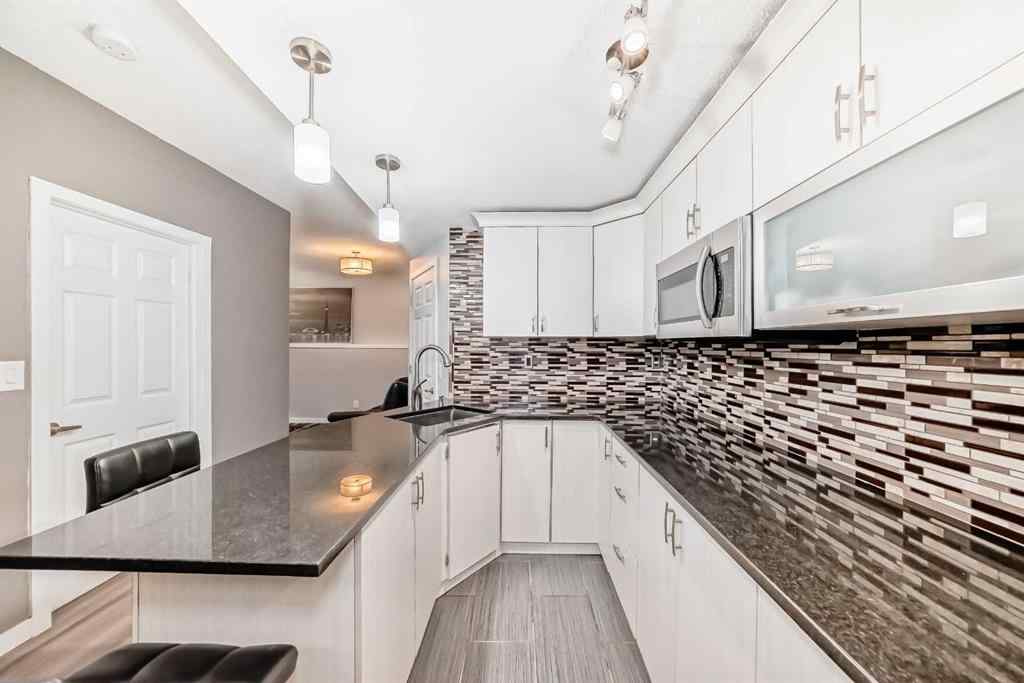 MLS® A2247336 - 165 Hillcrest Drive SW in Hillcrest Airdrie, Residential