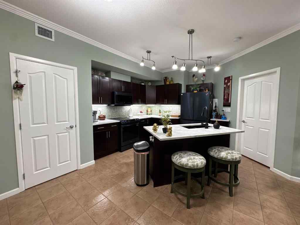 MLS® A2247341 - Unit #203 5040 53 Street  in Downtown Sylvan Lake, Residential