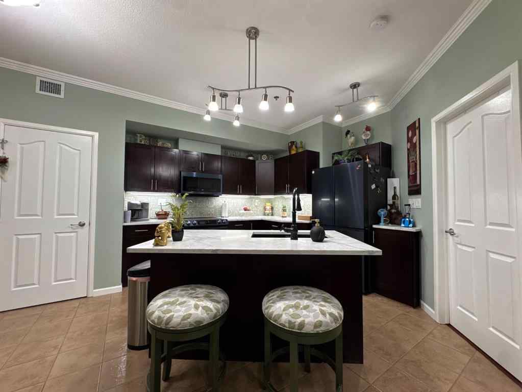 MLS® A2247341 - Unit #203 5040 53 Street  in Downtown Sylvan Lake, Residential
