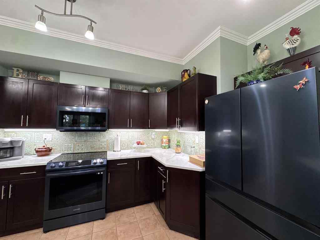 MLS® A2247341 - Unit #203 5040 53 Street  in Downtown Sylvan Lake, Residential