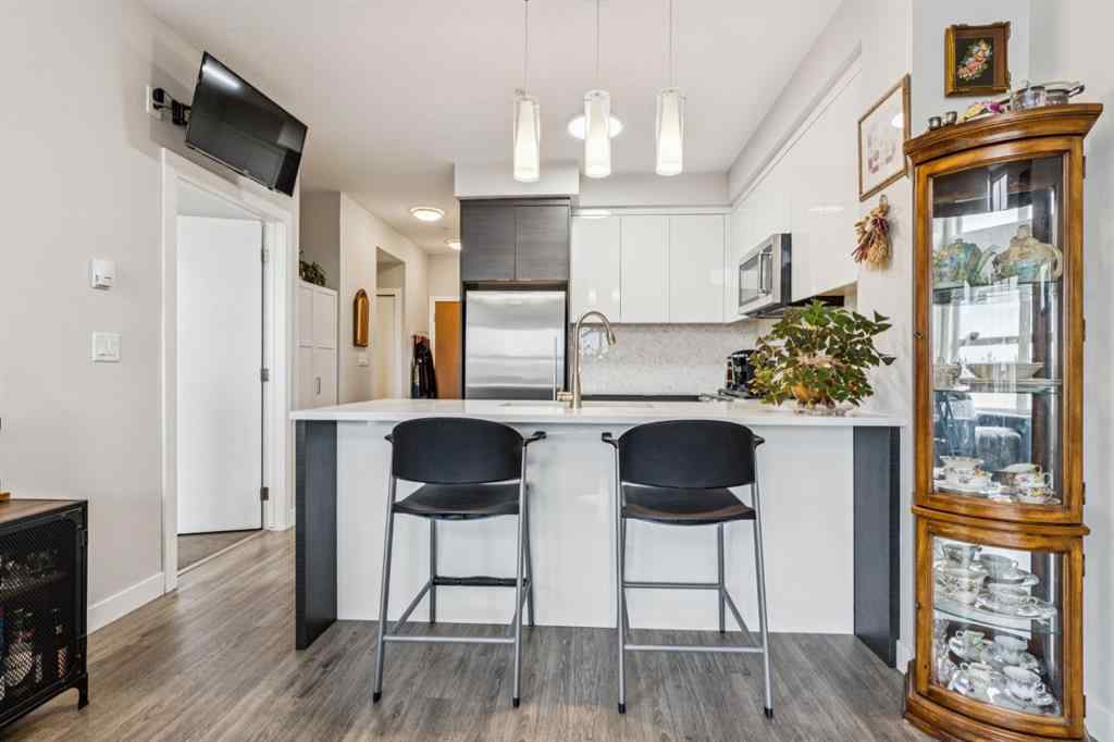 MLS® A2247344 - Unit #1402 95 Burma Star Road SW in Currie Barracks Calgary, Residential