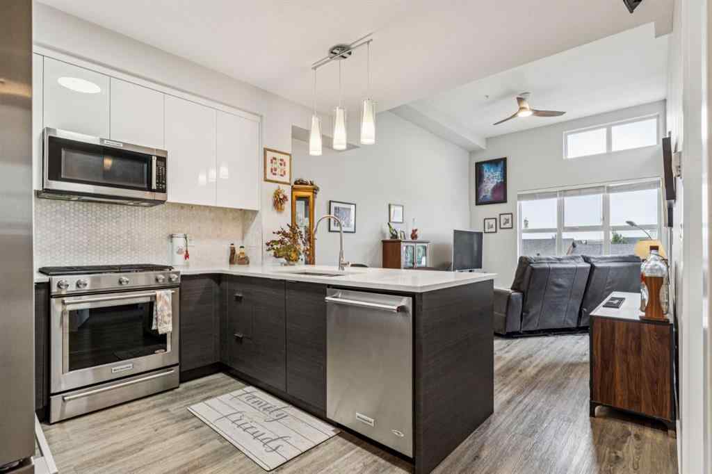 MLS® A2247344 - Unit #1402 95 Burma Star Road SW in Currie Barracks Calgary, Residential