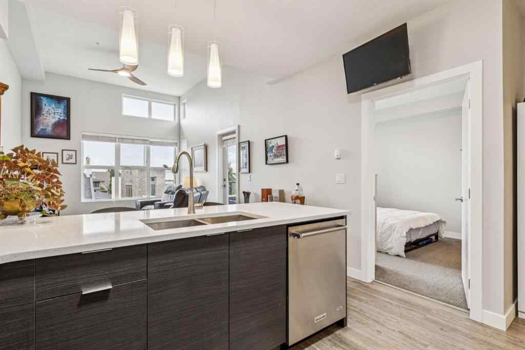 MLS® A2247344 - Unit #1402 95 Burma Star Road SW in Currie Barracks Calgary, Residential