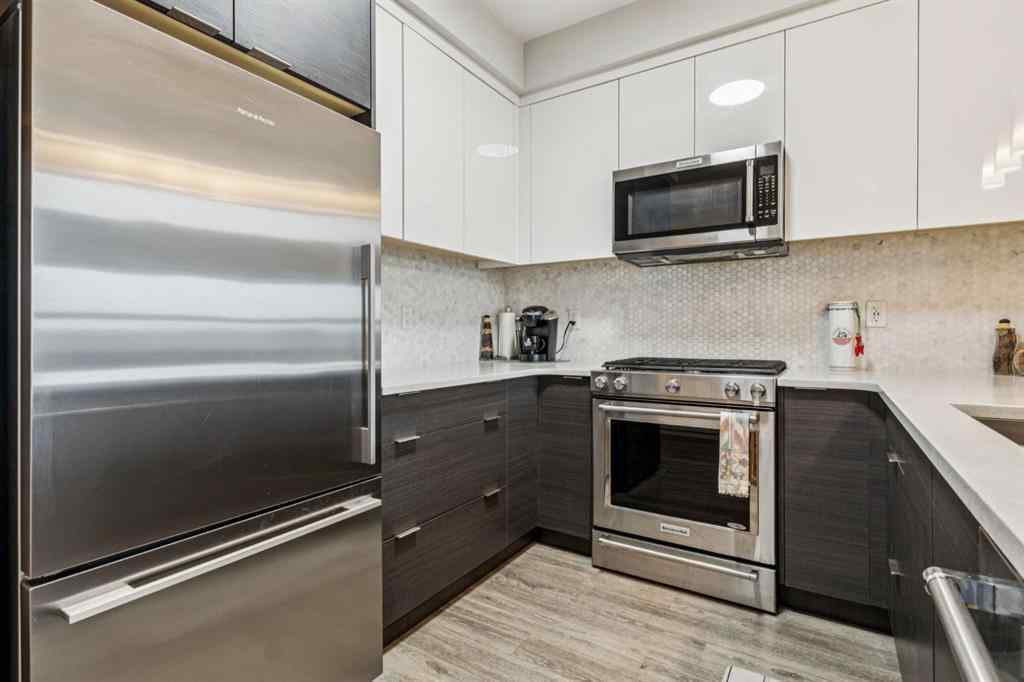 MLS® A2247344 - Unit #1402 95 Burma Star Road SW in Currie Barracks Calgary, Residential
