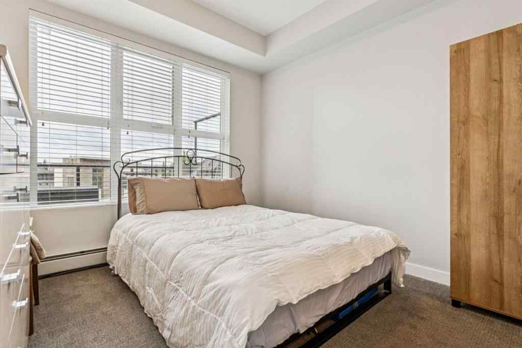 MLS® A2247344 - Unit #1402 95 Burma Star Road SW in Currie Barracks Calgary, Residential