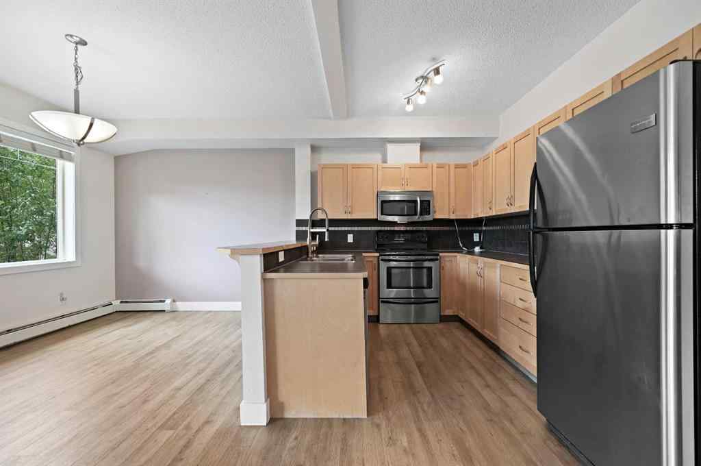 MLS® A2247353 - Unit #1212 211 Aspen Stone Boulevard SW in Aspen Woods Calgary, Residential