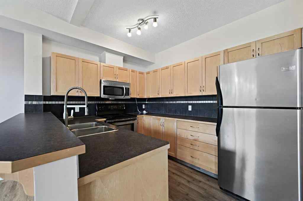 MLS® A2247353 - Unit #1212 211 Aspen Stone Boulevard SW in Aspen Woods Calgary, Residential