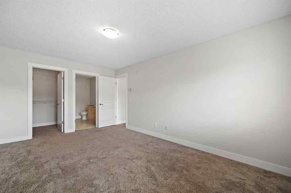 MLS® A2247353 - Unit #1212 211 Aspen Stone Boulevard SW in Aspen Woods Calgary, Residential