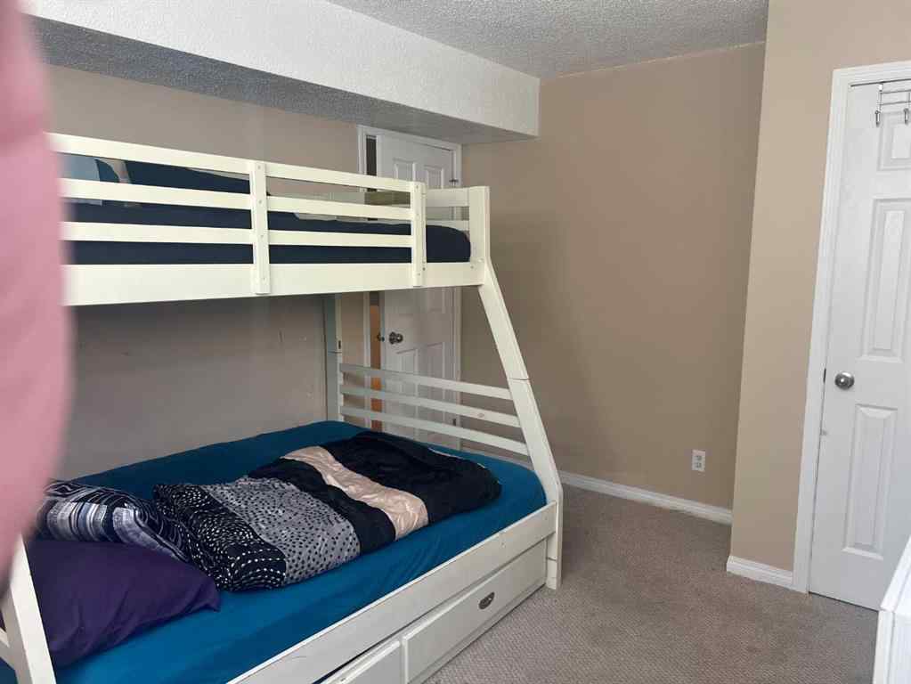 MLS® A2247370 - 79 Saddlebrook Common NE in Saddle Ridge Calgary, Residential