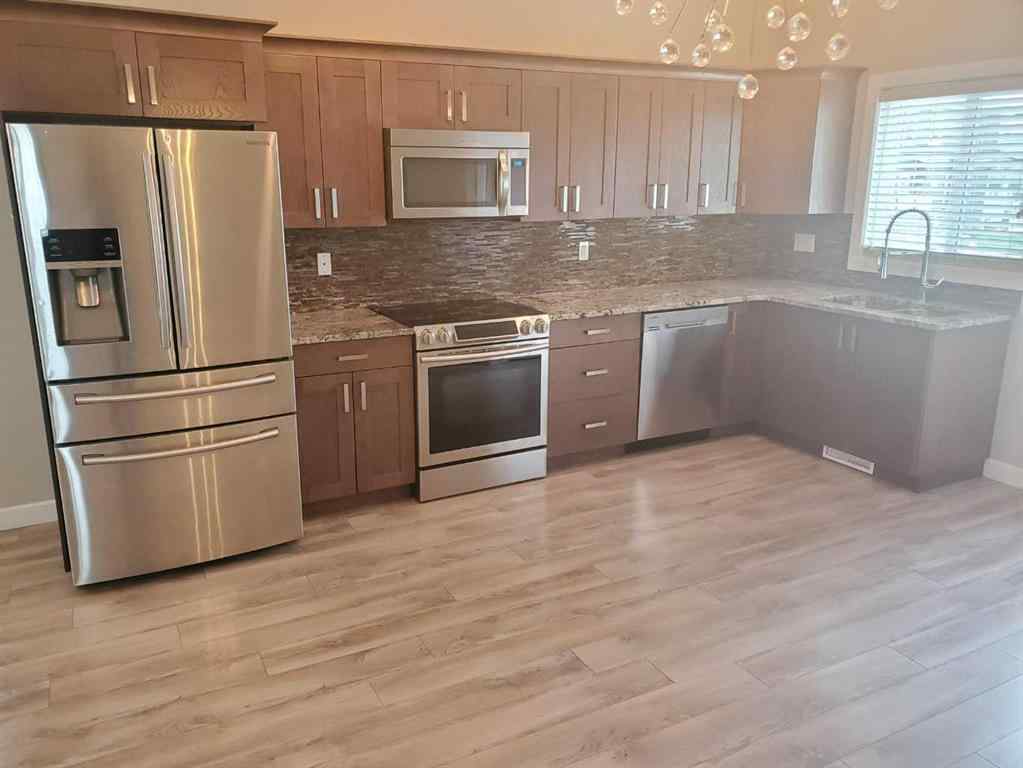 MLS® A2247372 - 10211 125 Avenue  in Northridge Grande Prairie, Residential