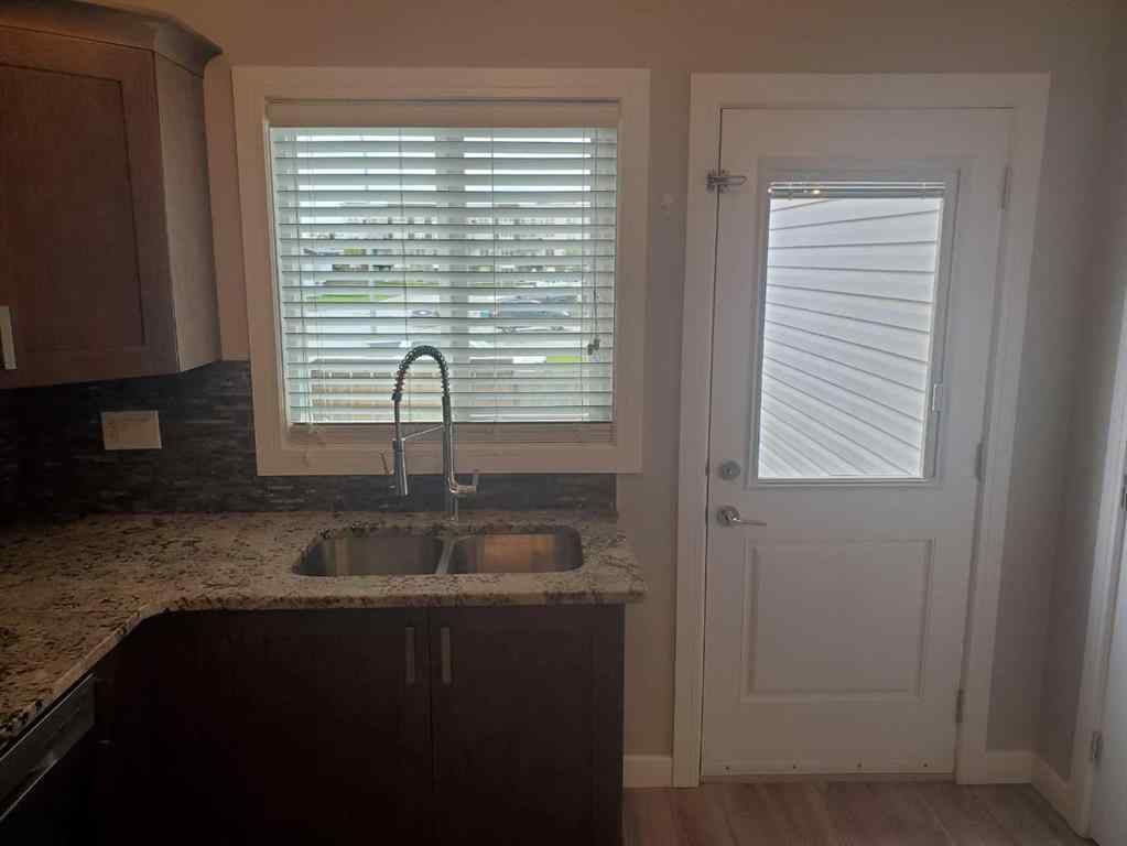 MLS® A2247372 - 10211 125 Avenue  in Northridge Grande Prairie, Residential