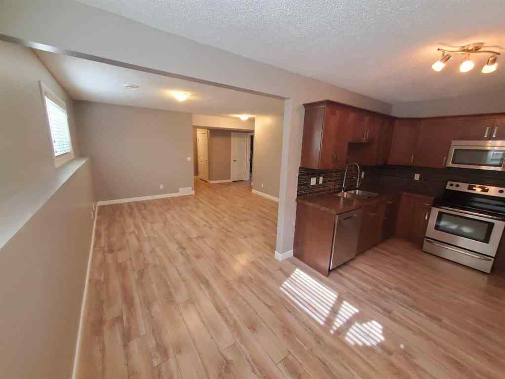 MLS® A2247372 - 10211 125 Avenue  in Northridge Grande Prairie, Residential