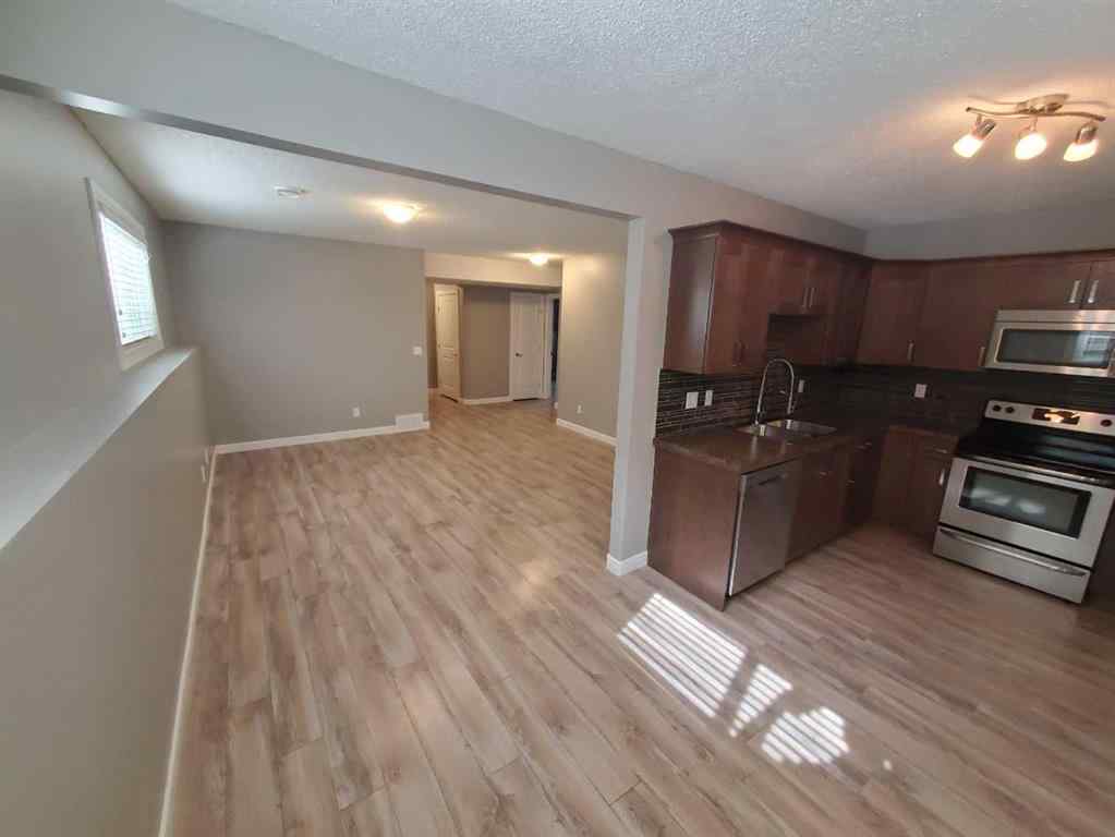 MLS® A2247372 - 10211 125 Avenue  in Northridge Grande Prairie, Residential
