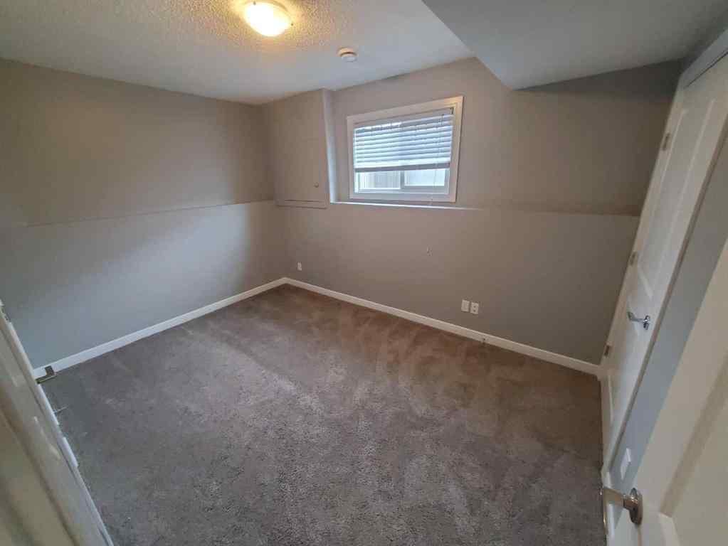 MLS® A2247372 - 10211 125 Avenue  in Northridge Grande Prairie, Residential