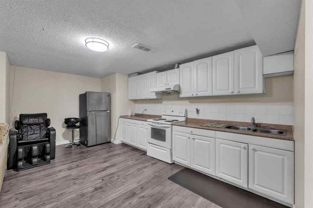 MLS® A2247373 - 138 Saddlecrest Park NE in Saddle Ridge Calgary, Residential