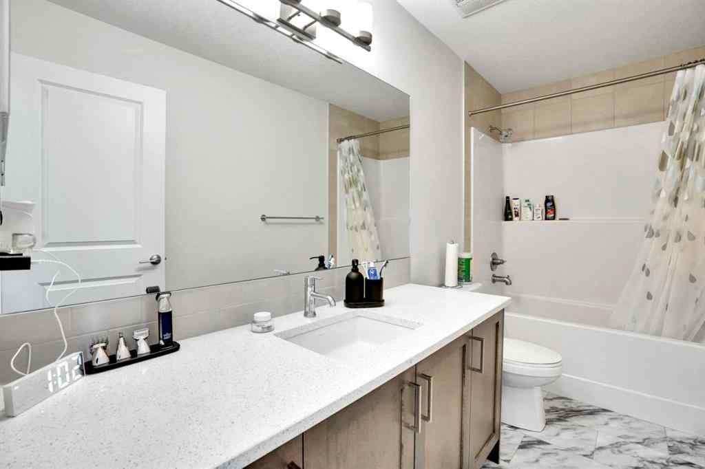 MLS® A2247408 - 1457 Bayview Point SW in Bayview Airdrie, Residential