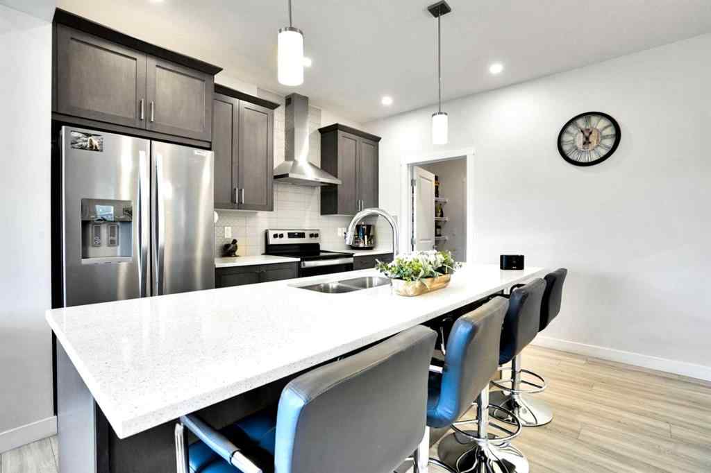 MLS® A2247408 - 1457 Bayview Point SW in Bayview Airdrie, Residential