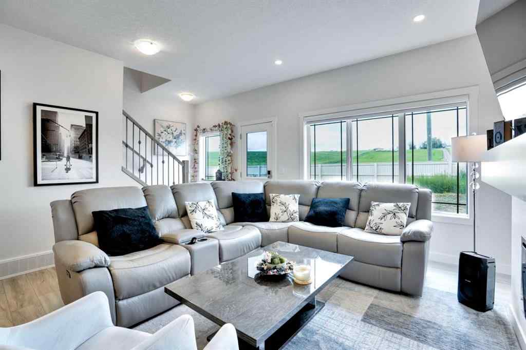 MLS® A2247408 - 1457 Bayview Point SW in Bayview Airdrie, Residential