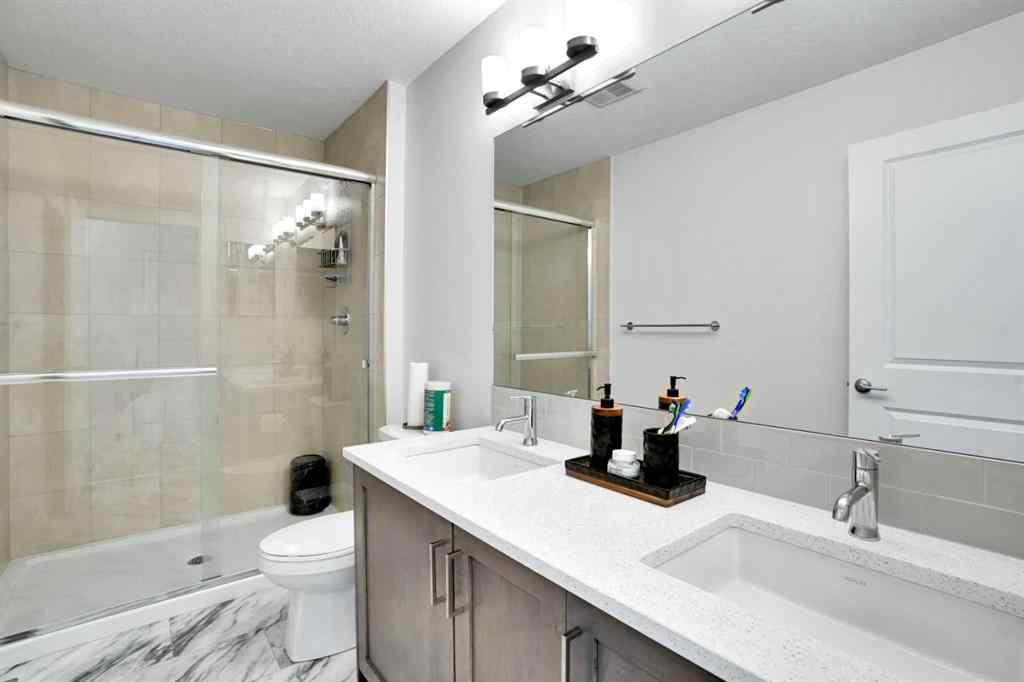MLS® A2247408 - 1457 Bayview Point SW in Bayview Airdrie, Residential