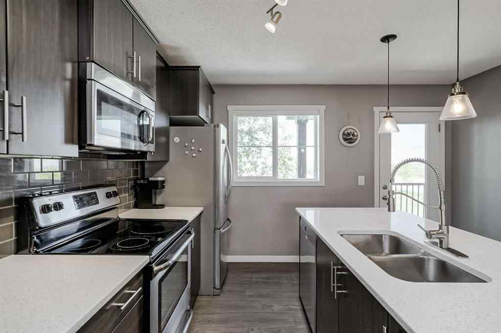 MLS® A2247411 - 313 Copperpond Landing SE in Copperfield Calgary, Residential