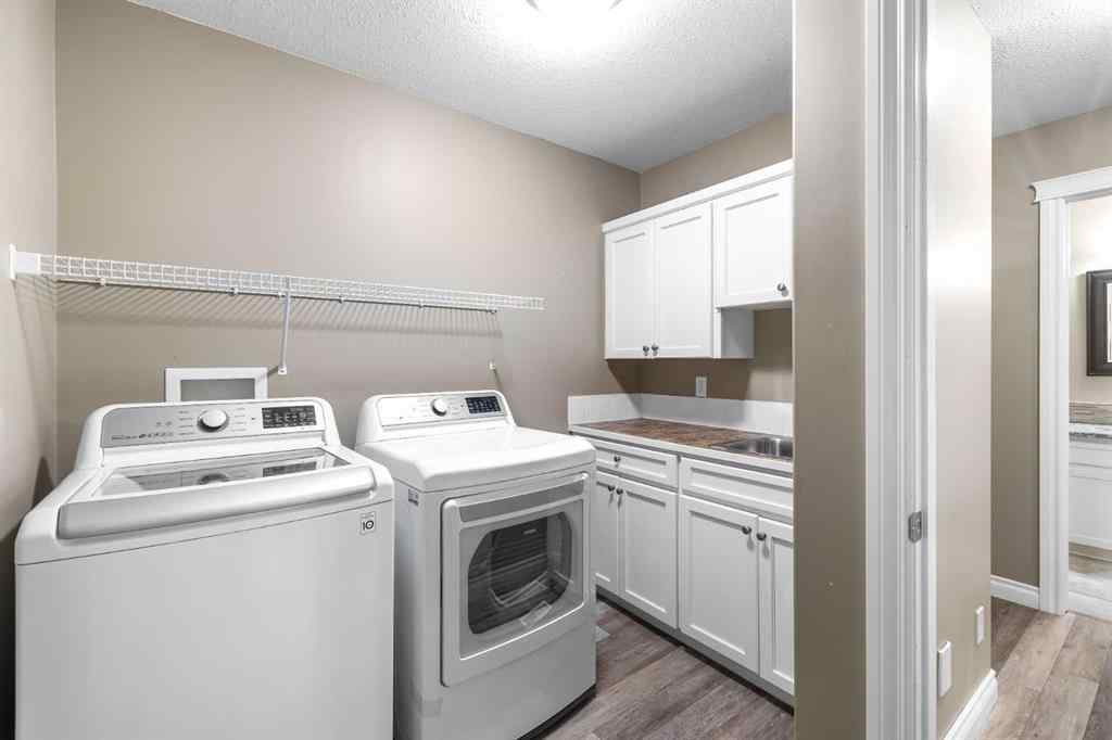 MLS® A2247451 - Unit #34 100 Sheep River Drive  in Sheep River Ridge Okotoks, Residential