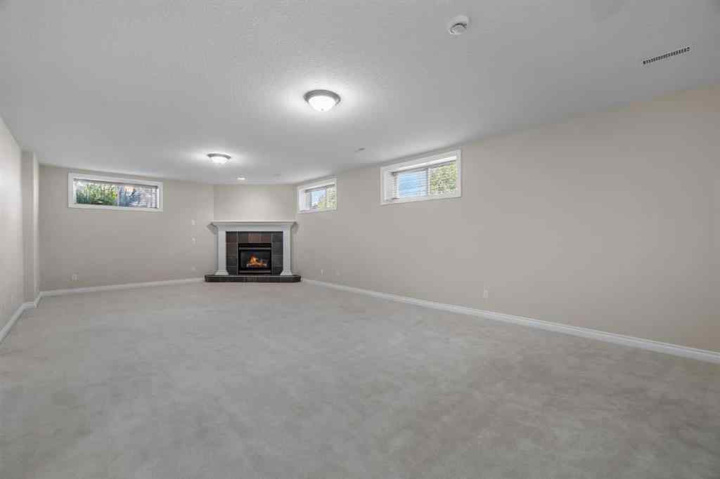 MLS® A2247451 - Unit #34 100 Sheep River Drive  in Sheep River Ridge Okotoks, Residential