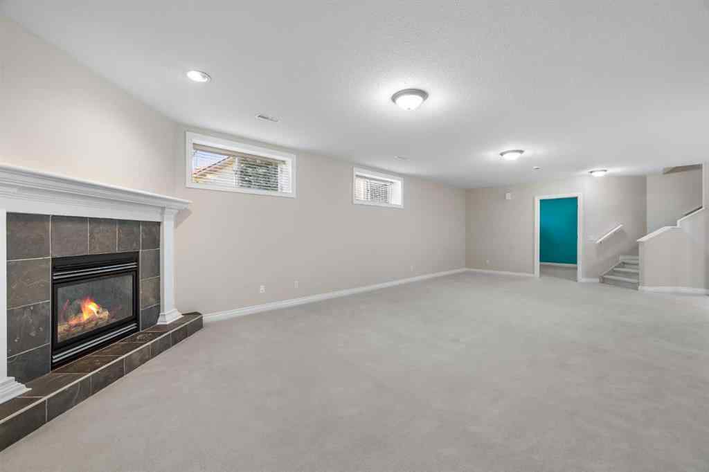 MLS® A2247451 - Unit #34 100 Sheep River Drive  in Sheep River Ridge Okotoks, Residential