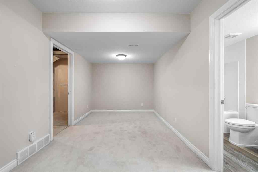 MLS® A2247451 - Unit #34 100 Sheep River Drive  in Sheep River Ridge Okotoks, Residential