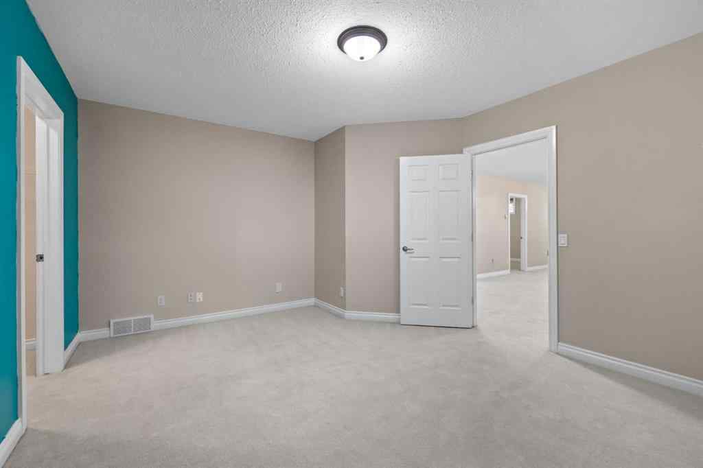 MLS® A2247451 - Unit #34 100 Sheep River Drive  in Sheep River Ridge Okotoks, Residential