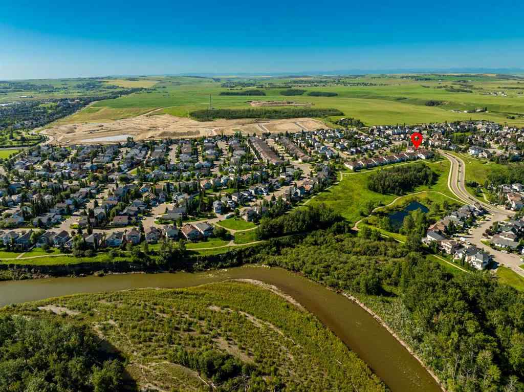 MLS® A2247451 - Unit #34 100 Sheep River Drive  in Sheep River Ridge Okotoks, Residential