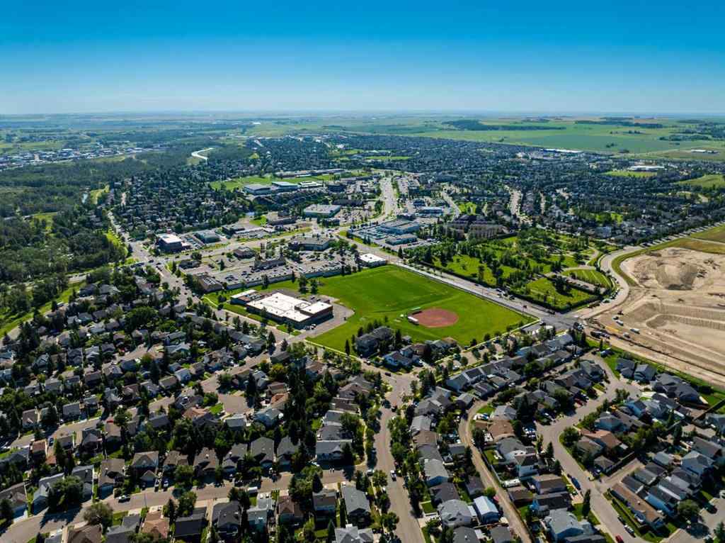 MLS® A2247451 - Unit #34 100 Sheep River Drive  in Sheep River Ridge Okotoks, Residential