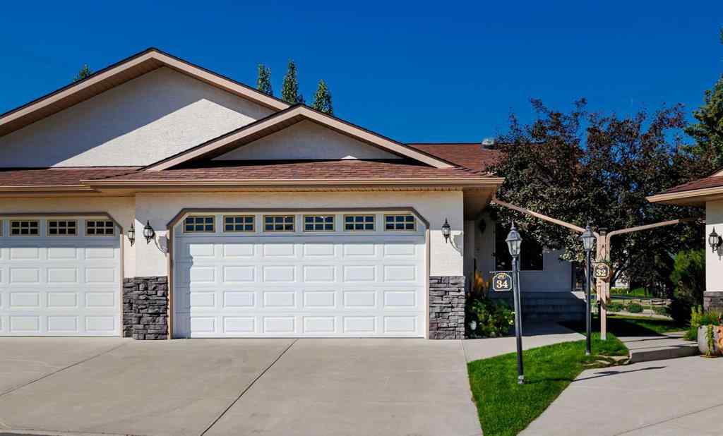 MLS® A2247451 - Unit #34 100 Sheep River Drive  in Sheep River Ridge Okotoks, Residential
