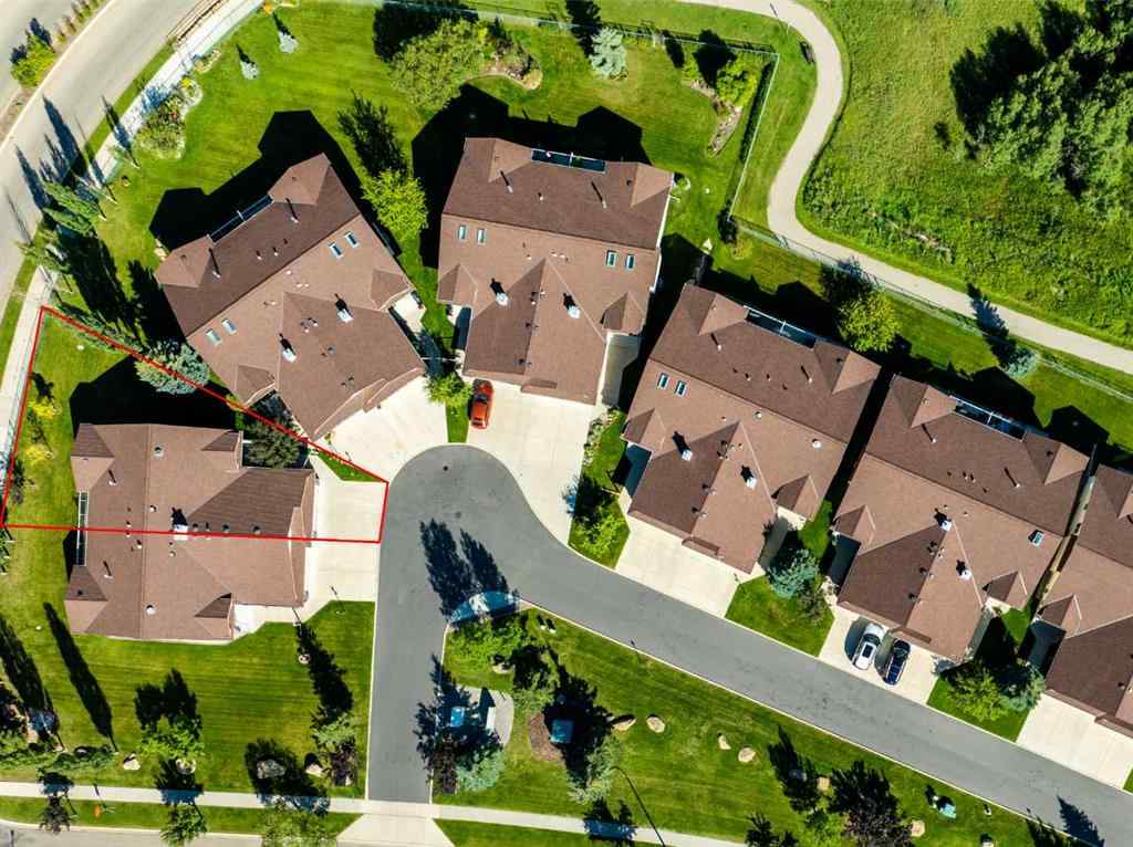 MLS® A2247451 - Unit #34 100 Sheep River Drive  in Sheep River Ridge Okotoks, Residential