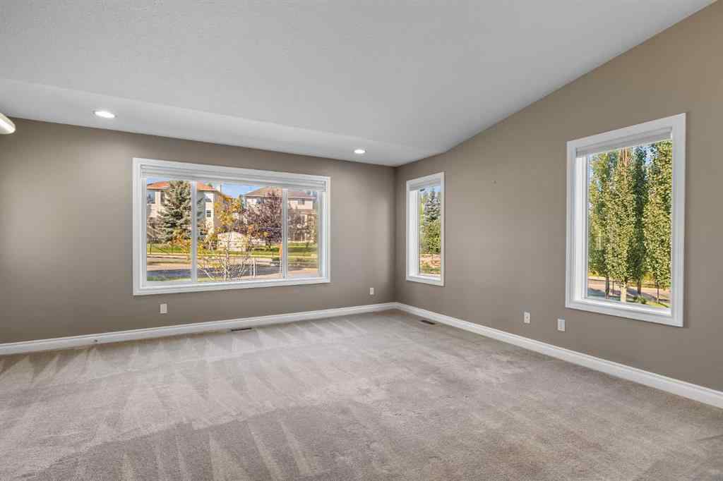MLS® A2247451 - Unit #34 100 Sheep River Drive  in Sheep River Ridge Okotoks, Residential